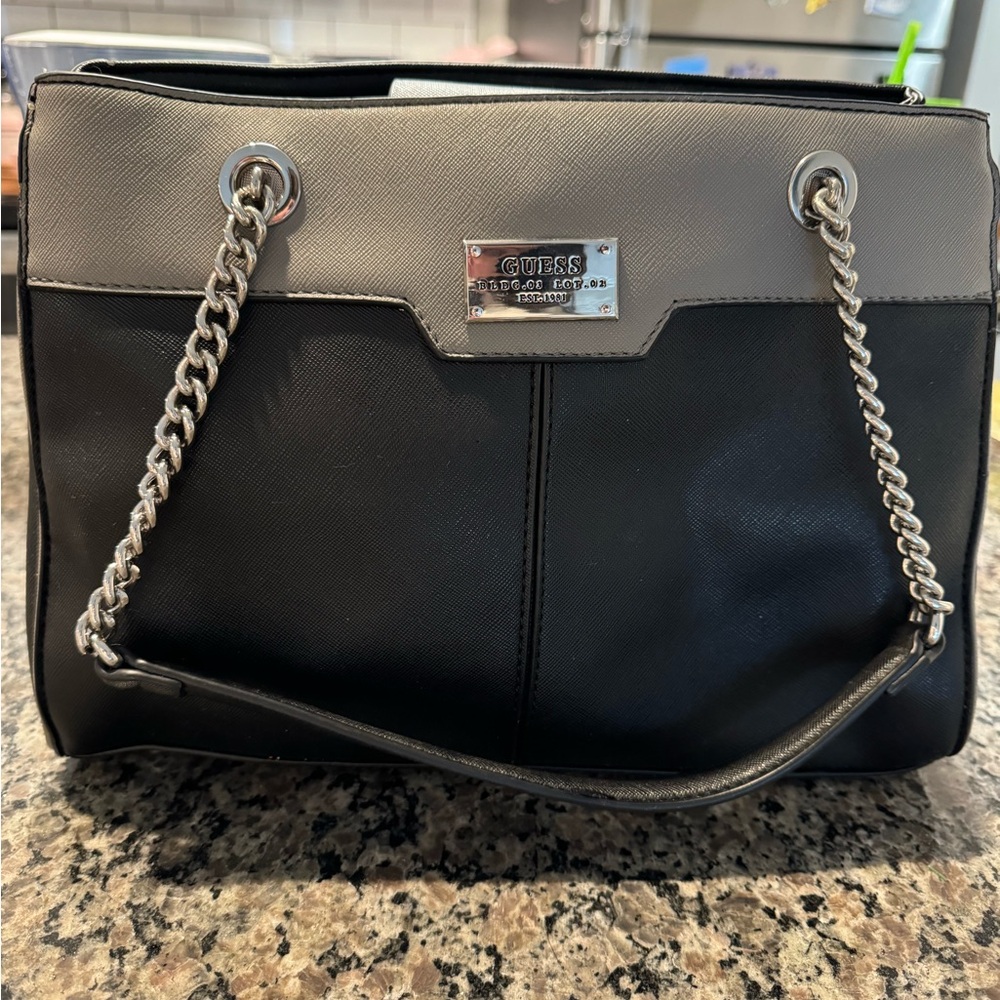 Black and gray Guess handbag